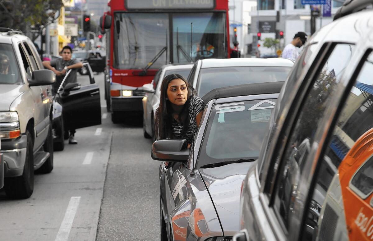 Traffic is stopped on La Cienega Boulevard at 3rd Street during the "Spring Into Love" rally.