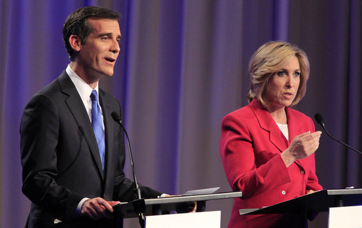 Los Angeles mayoral candidates Eric Garcetti and Wendy Greuel square off in a debate at USC's Health Sciences Campus.