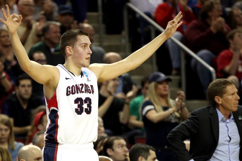 Gonzaga forward Kyle Wiltjer reacts after making one of his four three-point shots against Iowa during the Bulldogs' 87-68 victory over the Hawkeyes on Sunday.
