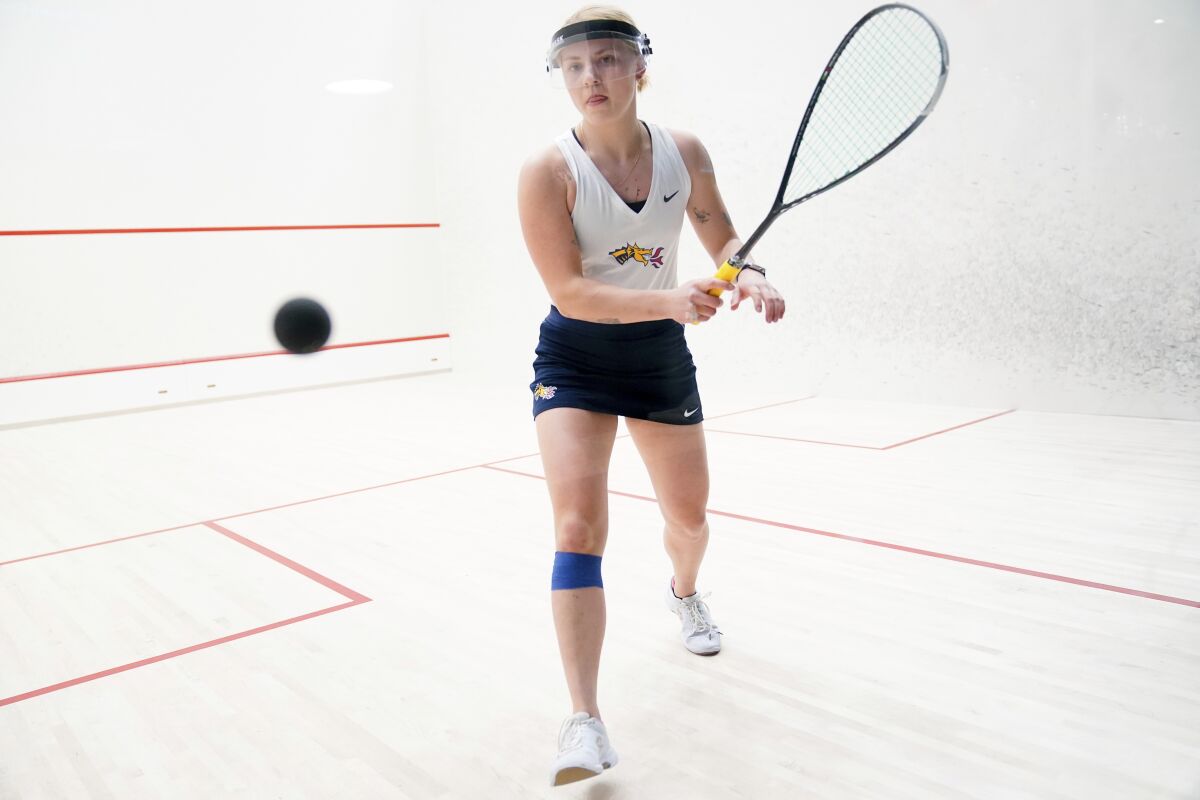Drexel's Alina Bushma of Ukraine warms up before a squash match in Philadelphia, Friday, March 4, 2022. (AP Photo/Matt Rourke)