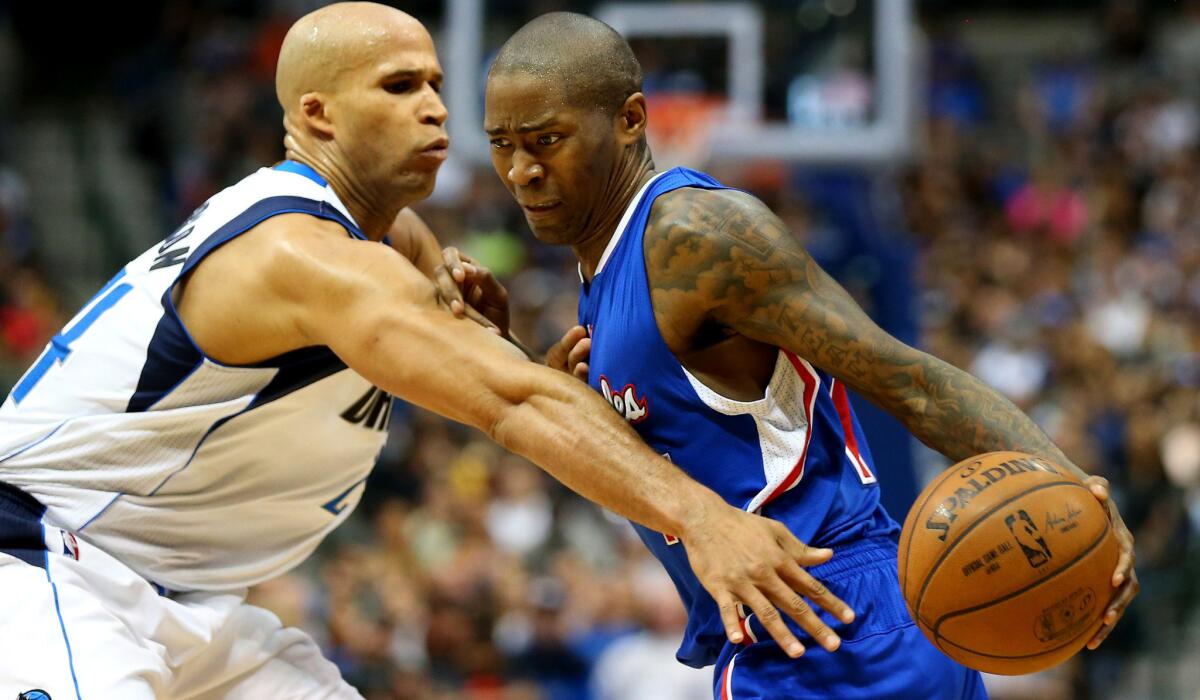 Clippers guard Jamal Crawford, driving against Mavericks forward Richard Jefferson earlier this season, hopes to be back into game condition by the playoffs.