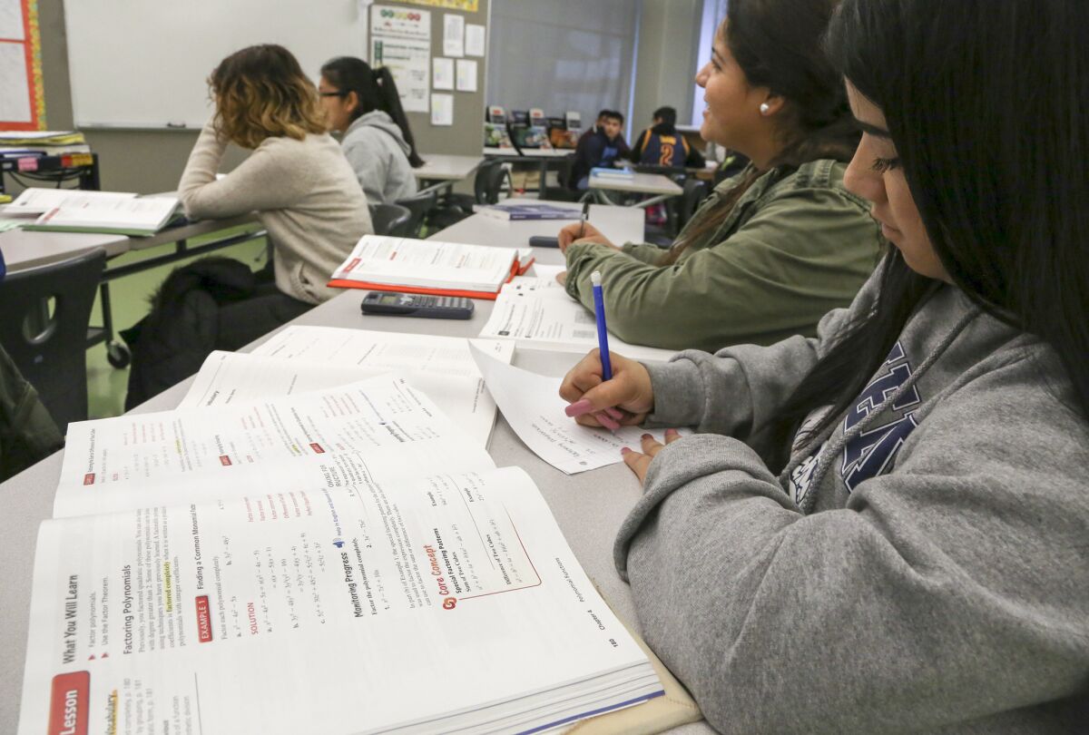 Students take notes in an algebra credit recovery course at Garfield High School in December 2016.