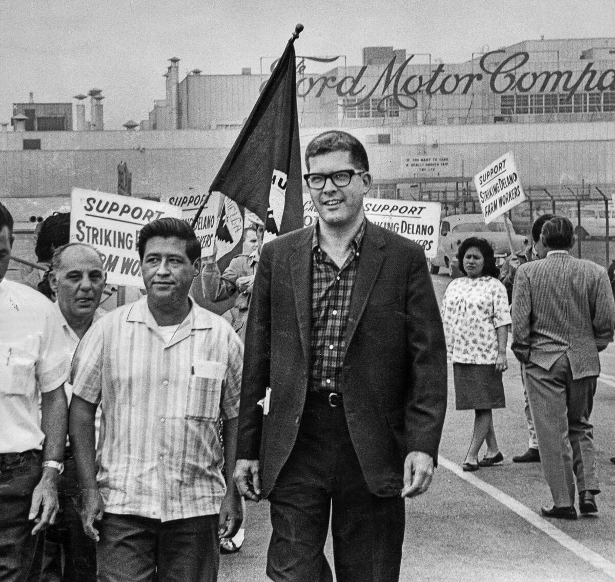 Sept. 15, 1967: Cesar Chavez, then director of the UFW Organizing Committee, walks the picket line in front of the Ford Motor Co. plant in Pico Rivera in support of striking United Auto Workers. With Chavez is Paul Schrade, UAW western director.