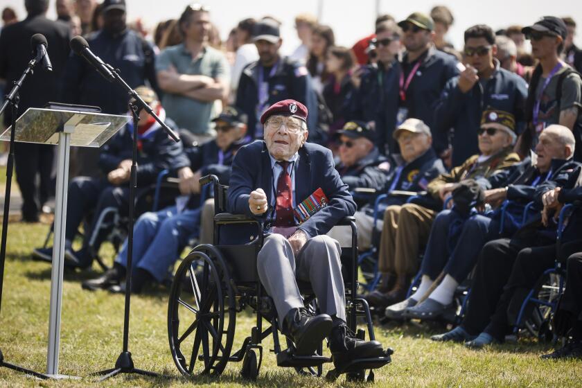 FILE - World War II veteran Britain's Bill Gladden attends a ceremony outside the Pegasus Bridge memorial in Benouville, Normandy, Monday June 5, 2023. Gladden, one of the dwindling number of veterans who took part in the landings that kicked off the campaign to liberate Western Europe from the Nazis during World War II, died Wednesday, April 24, 2024, his family said. He was 100. (AP Photo/Thomas Padilla, File)