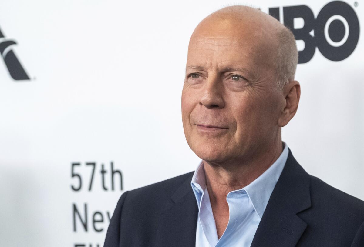 Bruce Willis jams out on harmonica after aphasia diagnosis - Los ...