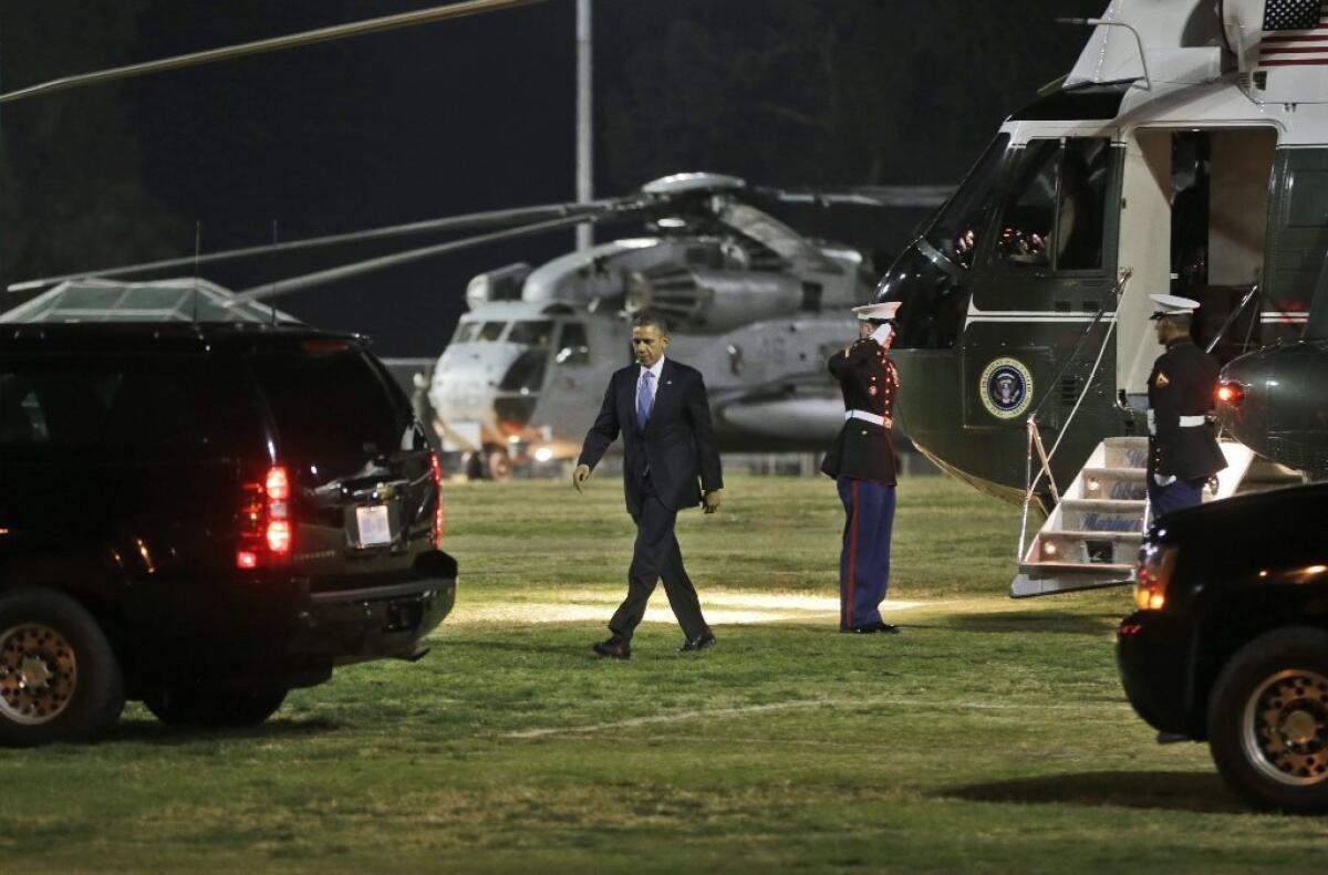 At Cheviot Hills Park, President Obama walks from Marine One to a waiting car to take him to visit the family of the TSA agent shot to death on duty at LAX, and then to Beverly Hills fundraising events.