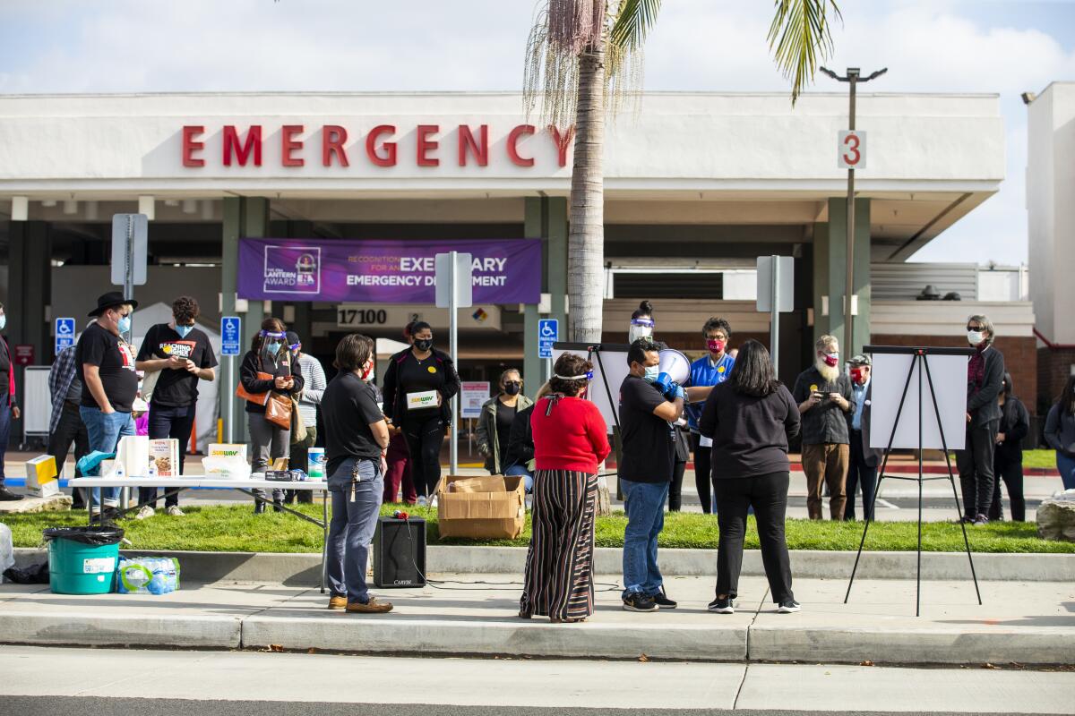 Workers demand stronger COVID-19 protections for caregivers and patients at Fountain Valley Regional Hospital.