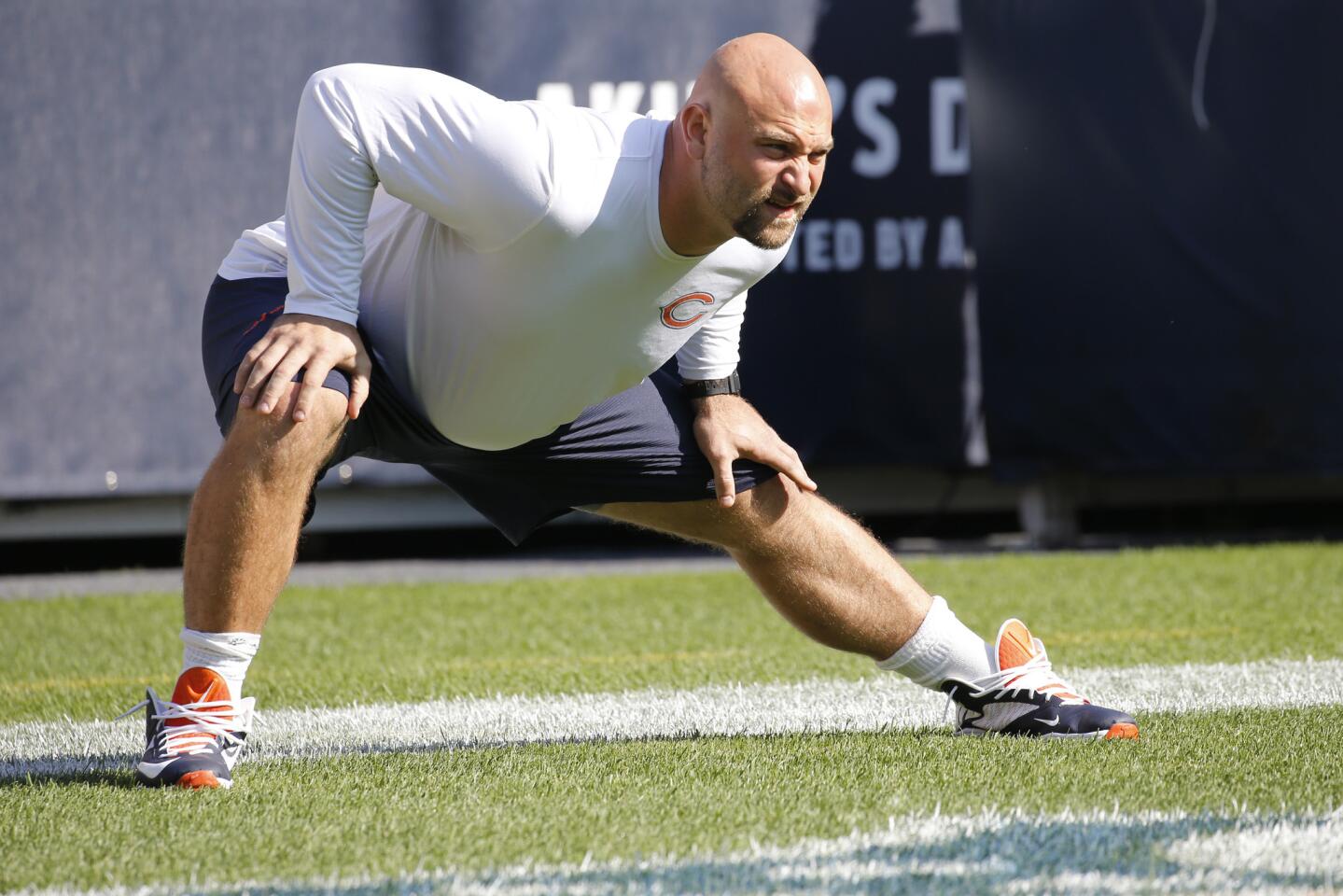 Bears offensive guard Kyle Long stretches during warmups before a game against the Steelers at Soldier Field on Sunday, Sept. 24, 2017.