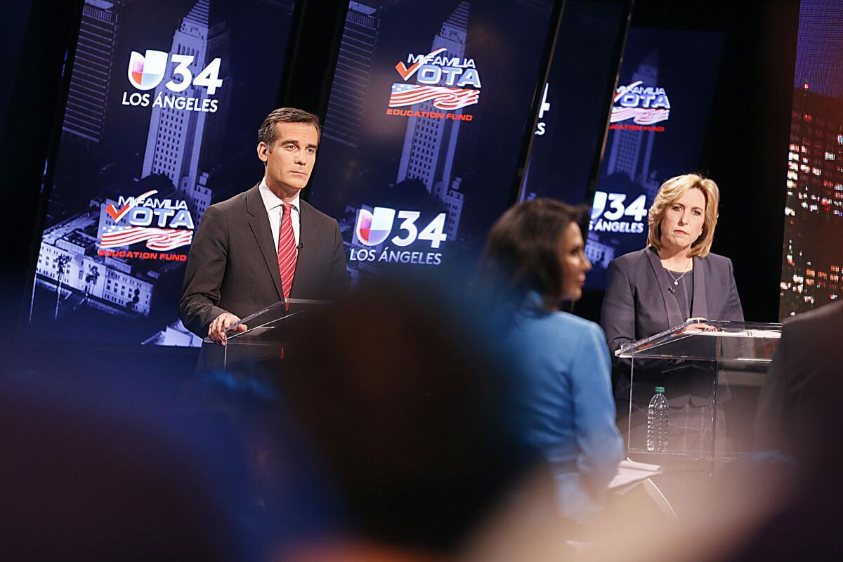 L.A. mayoral candidates Eric Garcetti and Wendy Greuel face off in a debate.