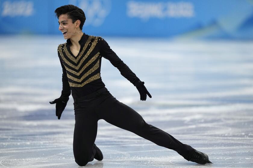 Donovan Carrillo, of Mexico, competes during the men's short program figure skating competition at the 2022 Winter Olympics, Tuesday, Feb. 8, 2022, in Beijing. (AP Photo/David J. Phillip)