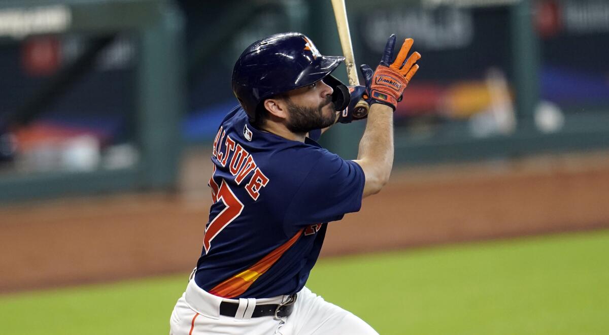 Houston Astros second baseman Jose Altuve bats during an intrasquad game.