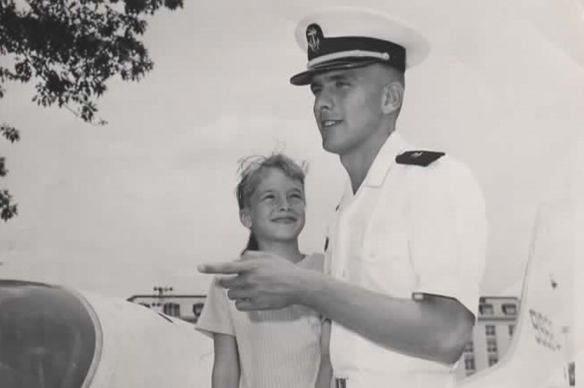 Henry N. Pilger, as a Naval Academy plebe from Syracuse, N.Y., shows his 7-year-old sister, Marie "Mimi," around the campus.