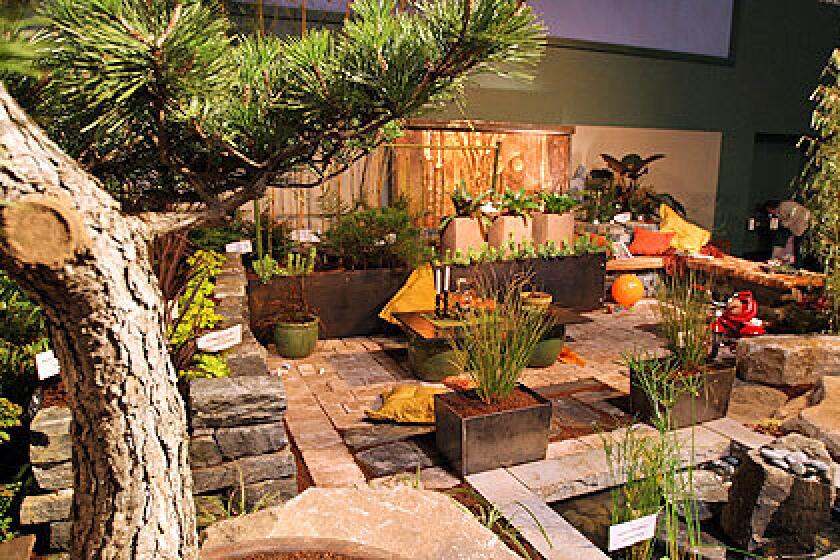 Garden designers at the Northwest Flower & Garden Show in Seattle mounted elaborate displays using containers and planters to artfully landscape small urban spaces. There were many ideas that would work well in L.A., where more Angelenos are living in condominiums and apartment. Eden Landscape Designs display garden showed how stonework and containers can create visual interest in limited space.