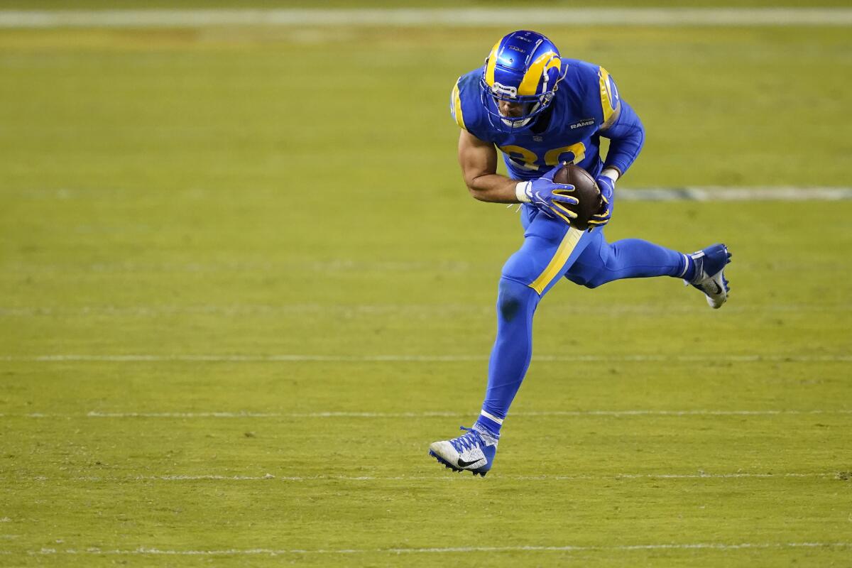 Rams tight end Tyler Higbee runs with the ball against the San Francisco 49ers