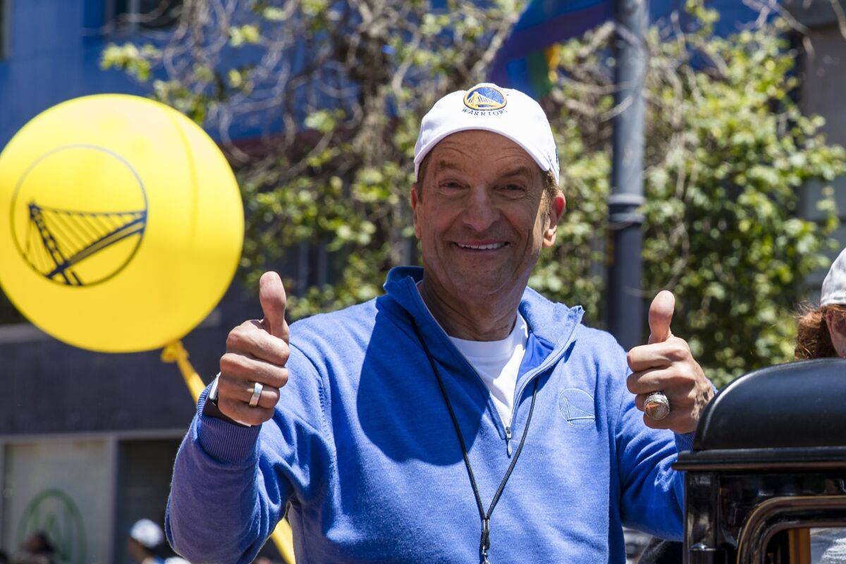 Peter Guber gives a thumbs up to the camera.