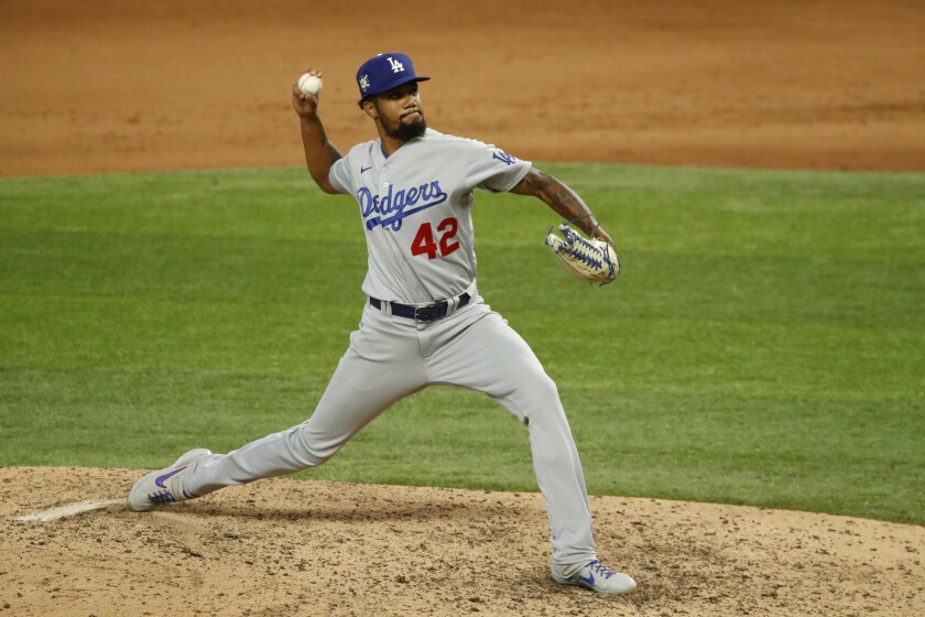 Dodgers pitcher Dennis Santana throws against the Texas Rangers in August.