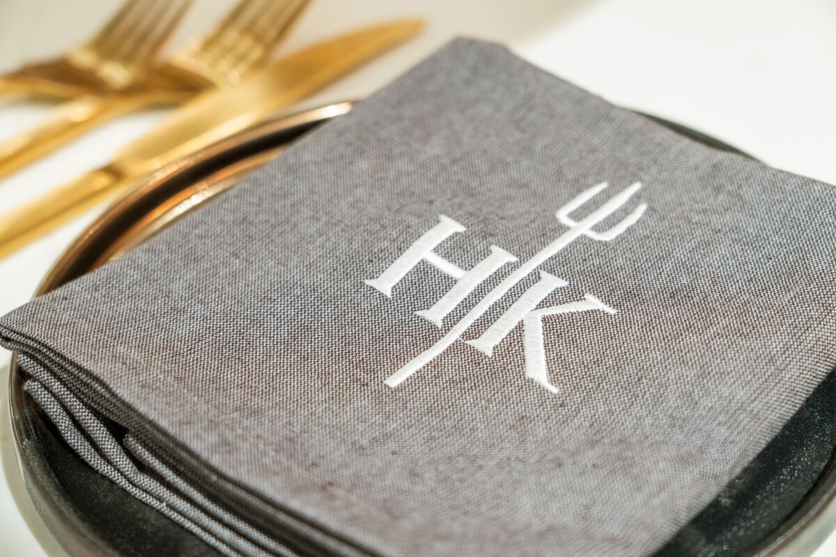 The "Hell's Kitchen" TV show pitchfork logo can be found all over the new Hell's Kitchen restaurant.