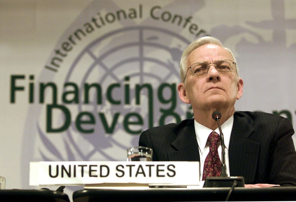FILE - In this March 20, 2002 file photo, U.S. Treasury Secretary Paul O'Neill holds a news conference at the U.N. Conference for Financing of Development in Monterrey, Mexico. O’Neill, a former Treasury secretary who broke with Bush over tax policy and then produced a book critical of the administration, died Saturday, April 18, 2020. He was 84.