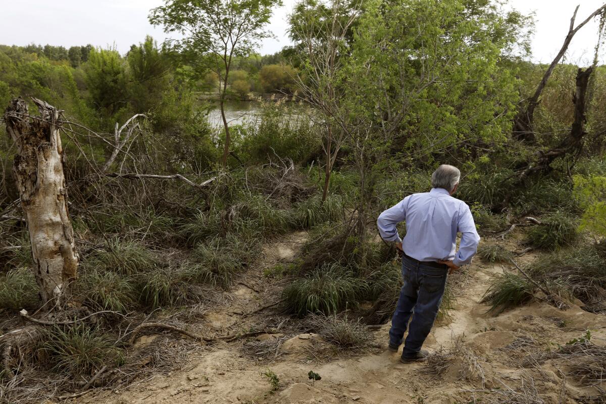 In Roma, Texas, some residents like Noel Benavides, 75, oppose the wall that may cross his land; he says it won't stop border traffic.