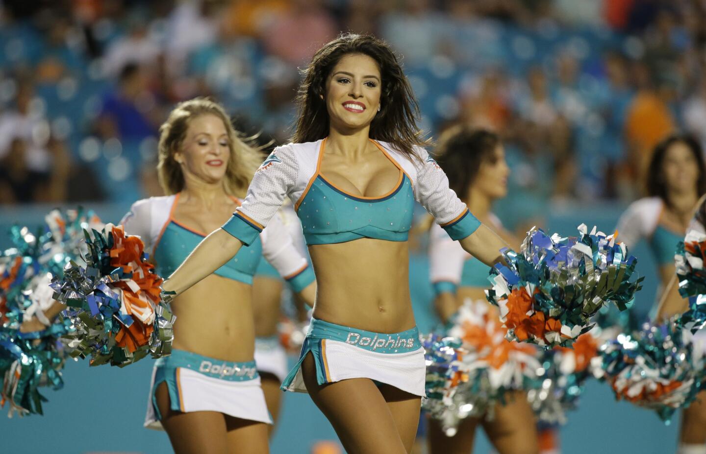 Miami Dolphins cheerleaders perform during the first half of an NFL preseason football game against the Atlanta Falcons, Saturday, Aug. 29, 2015 in Miami Gardens, Fla. (AP Photo/Wilfredo Lee) ORG XMIT: OTK ORG XMIT: S-S1508292023401040