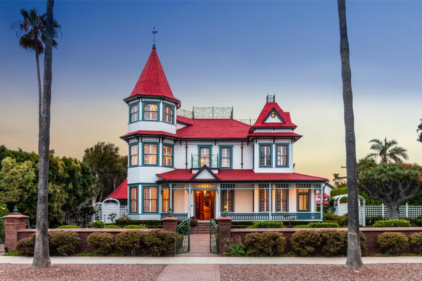 Built in 1887, the Queen Anne Victorian is navigated by an architectural staircase that spirals through four levels of living spaces.