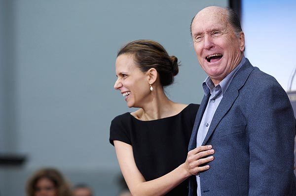 Actor Robert Duvall and his wife, Luciana Pedraza, share a moment during Duvall's hand and foot ceremony, celebrating his "50 years of excellence in film" on the Hollywood Walk of Fame on Wednesday. Updated 7:30 p.m. January 5: An earlier version of this photo gallery said that actor Robert Duvall was being awarded a star on the Hollywood Walk of Fame. Instead, he was asked to put prints of his hands and feet at Grauman's Chinese Theatre in Hollywood.