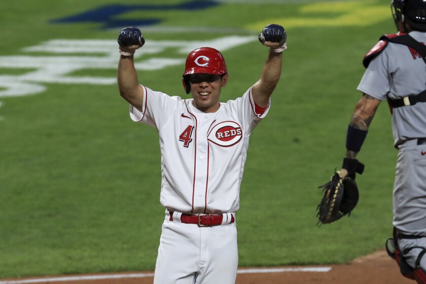 Cincinnati Reds' Shogo Akiyama reacts to scoring the game winning run on a walk-off RBI single by Joey Votto in the ninth inning during a baseball game against the St. Louis Cardinals in Cincinnati, Wednesday, Sep. 2, 2020. (AP Photo/Aaron Doster)