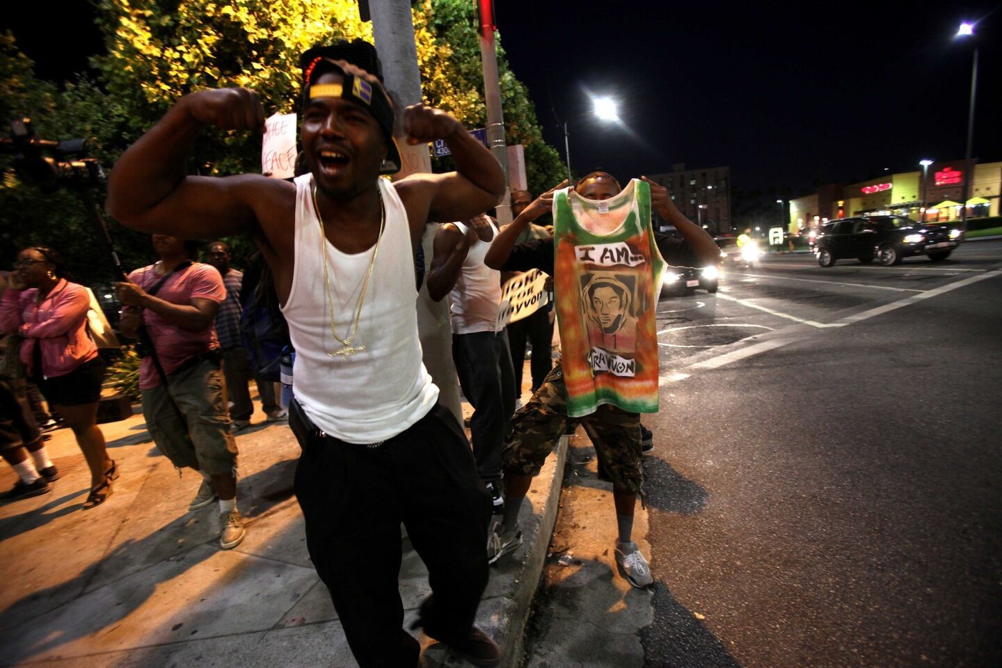 Protesters in Leimert Park demonstrate against the verdict in the George Zimmerman trial.