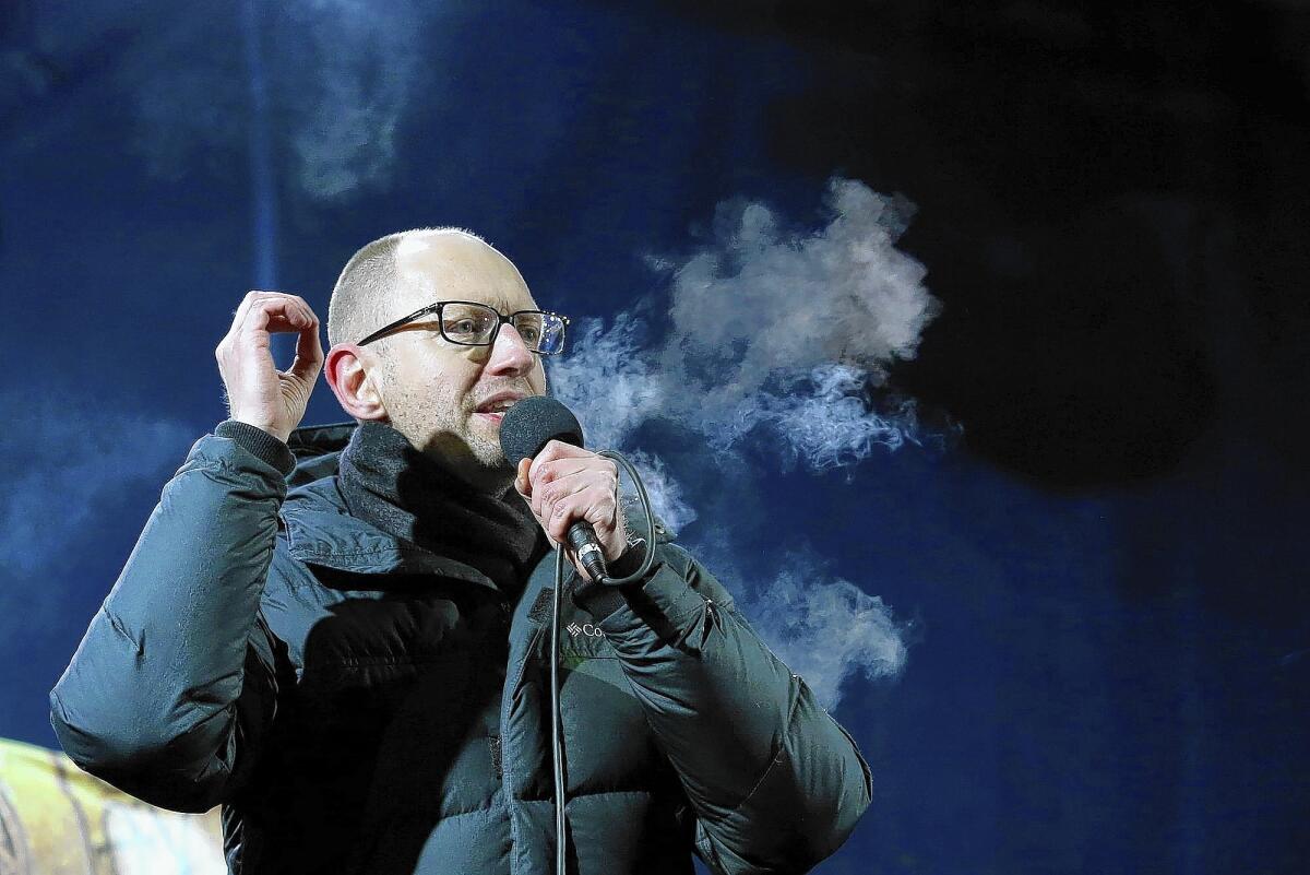 Arseny Yatsenyuk, who was chosen as Ukraine's interim prime minister, said police forces had been deployed around the gunmen-occupied government buildings in the Crimean region.
