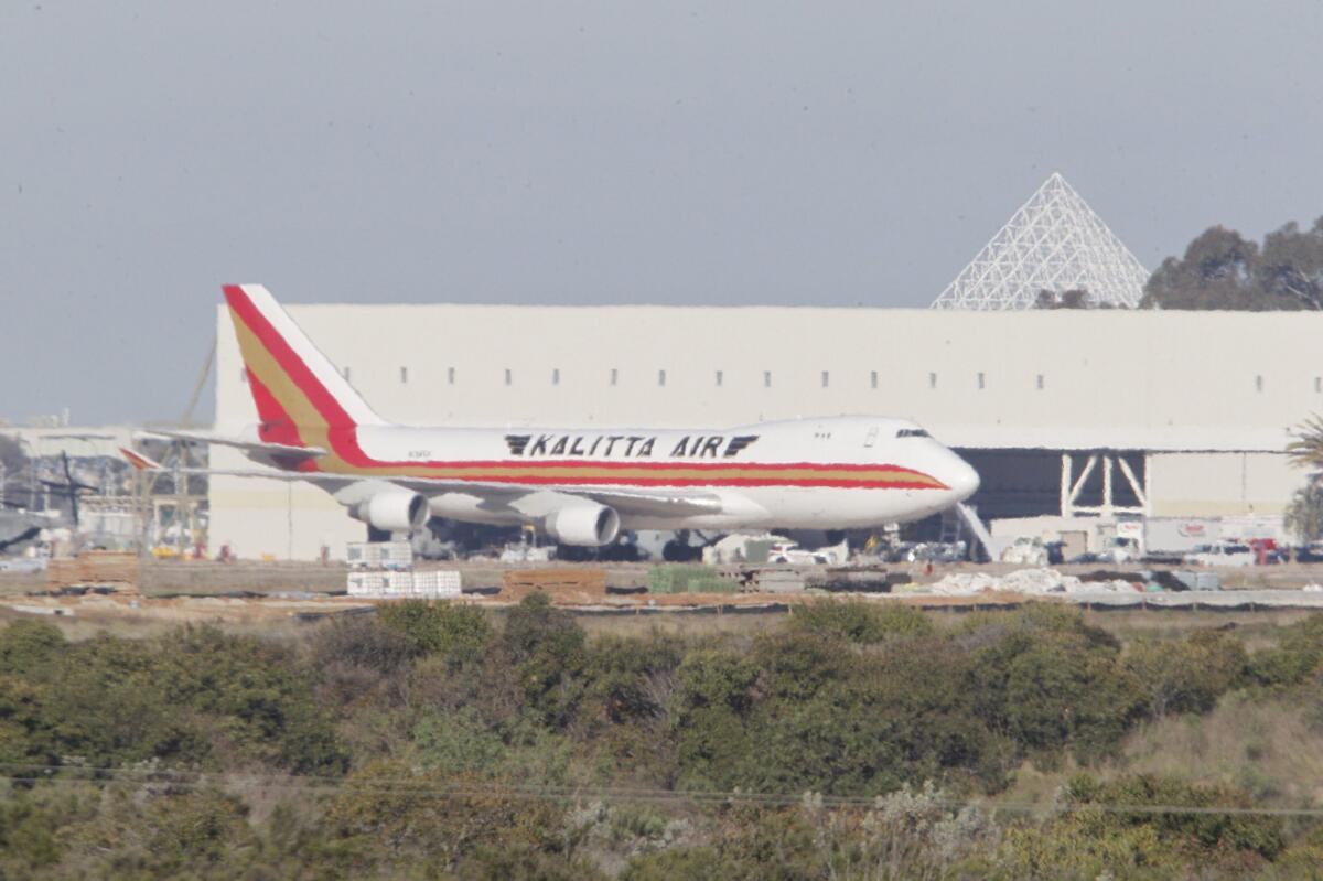 A Kalitta Air jet carrying U.S. citizens evacuated from China, where the coronavirus is raging, landed at Marine Corps Air Station Miramar about 8:30 a.m. Friday.