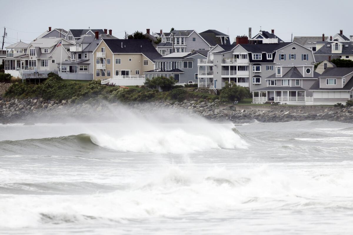 Waves come ashore in Hampton Beach, N.H. 