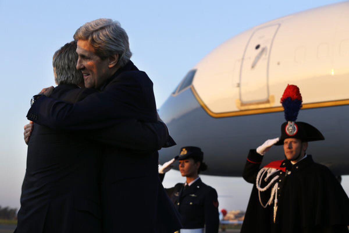 Secretary of State John F. Kerry, arriving in Rome on Wednesday for talks on Syria, is greeted by David Thorne, U.S. Ambassador to Italy.