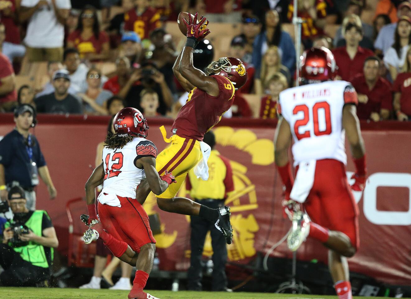 USC receiver Juju Smith-Schuster hauls in a 25-yard touchdown pass in the fourth quarter of a game against Utah at the Coliseum on Oct. 24.