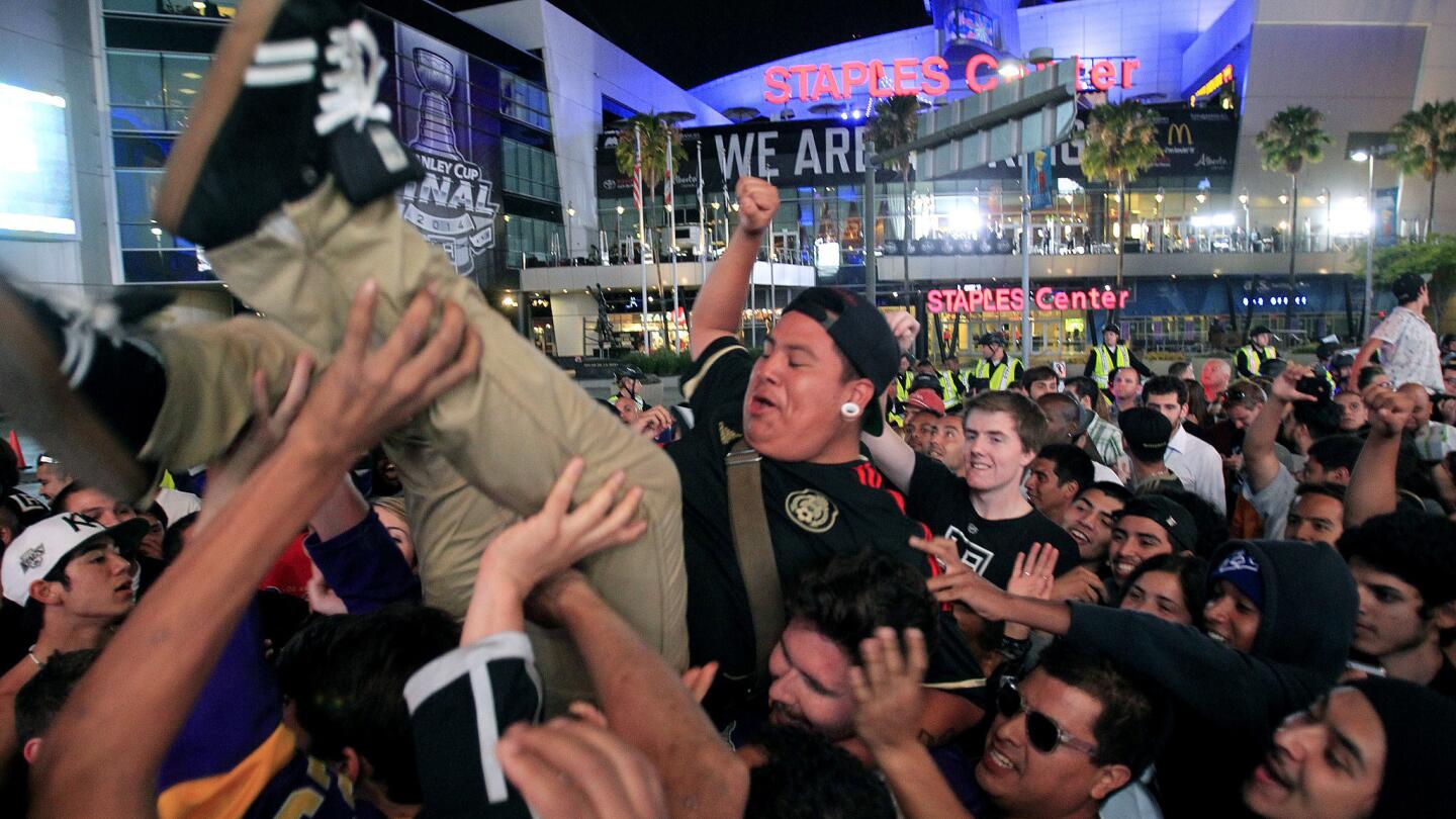 Kings fans celebrate outside Staples Center after the Kings beat the Rangers in Game 5 of the Stanley Cup Final.