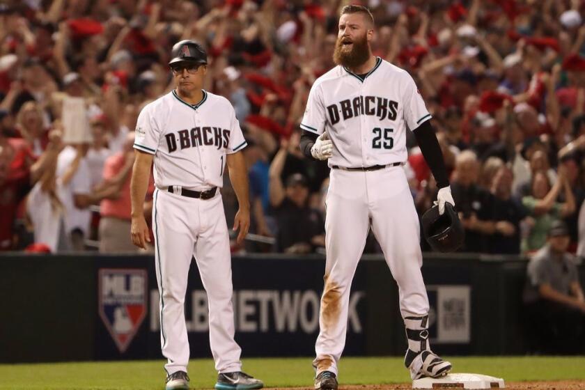 PHOENIX, AZ - OCTOBER 04: Archie Bradley #25 of the Arizona Diamondbacks reacts after hitting aN RBI triple during the bottom of the seventh inning of the National League Wild Card game against the Colorado Rockies at Chase Field on October 4, 2017 in Phoenix, Arizona. (Photo by Christian Petersen/Getty Images) ** OUTS - ELSENT, FPG, CM - OUTS * NM, PH, VA if sourced by CT, LA or MoD **