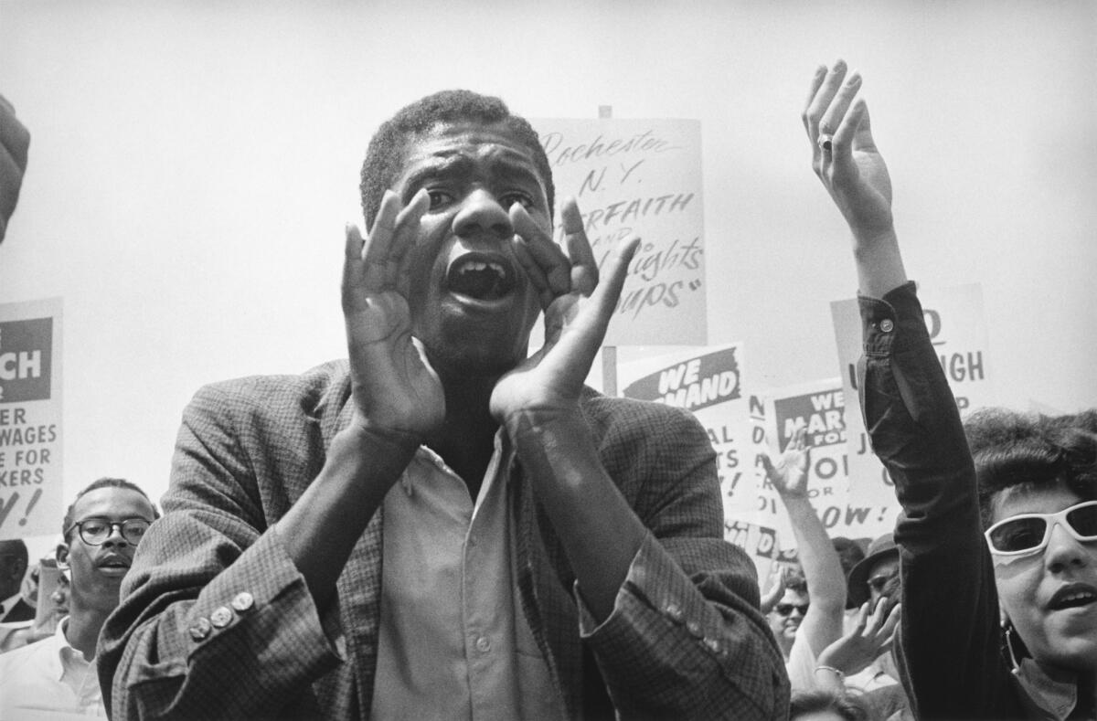 A demonstrator sounds off during the March on Washington for Jobs and Freedom.