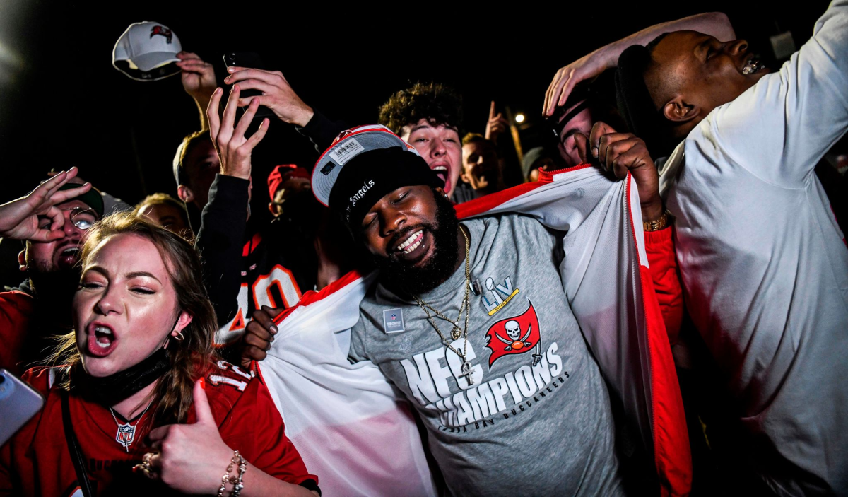 Tampa Bay Buccaneers fans celebrate their team's victory over the Kansas City Chiefs in Super Bowl LV.