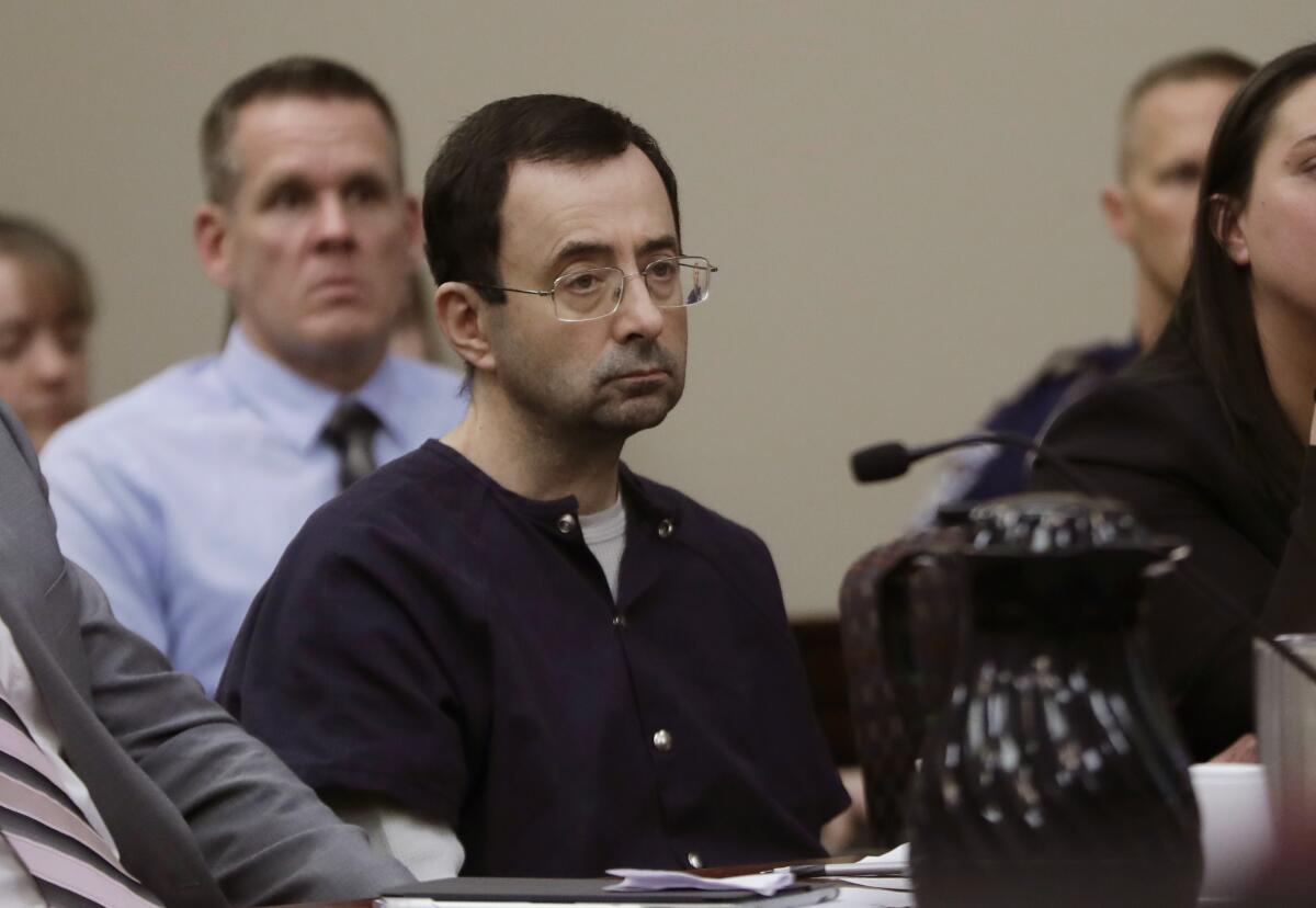 FILE -Larry Nassar sits during his sentencing hearing Wednesday, Jan. 24, 2018, in Lansing, Mich. On Friday, June 17, 2022 the Michigan Supreme Court has rejected a final appeal from sports doctor Larry Nassar, who was sentenced to decades in prison for sexually assaulting gymnasts, including Olympic medalists. (AP Photo/Carlos Osorio, File)