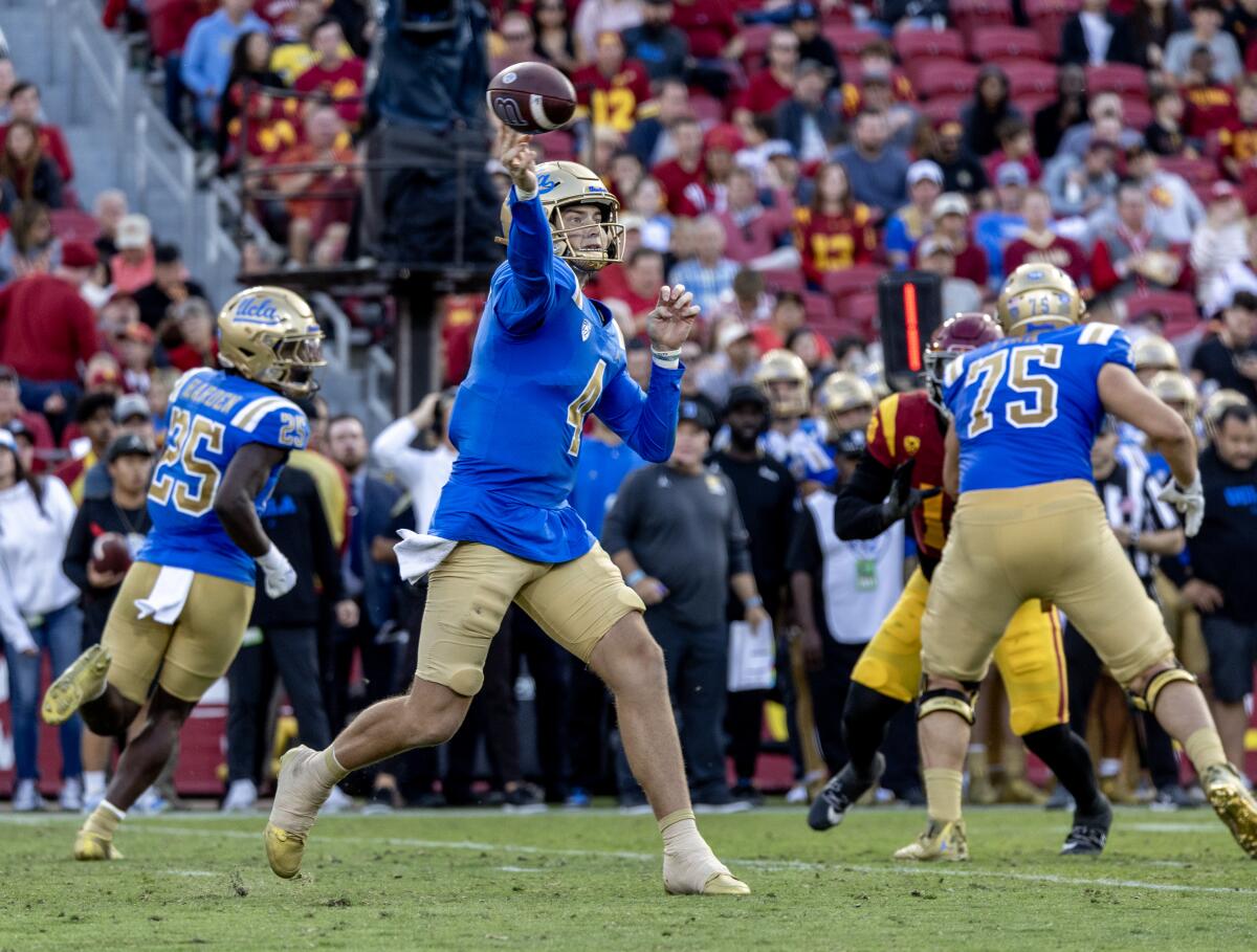 LOS ANGELES, CA - NOVEMBER 18, 2023: UCLA Bruins quarterback Ethan Garbers (4) gets his pass.