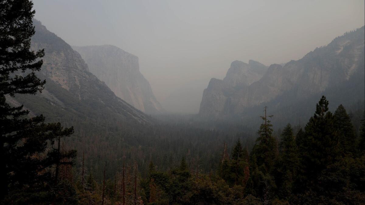 A tunnel view leading to the Yosemite Valley, the most popular destination in Yosemite National Park, is clouded in smoke from the Ferguson fire.