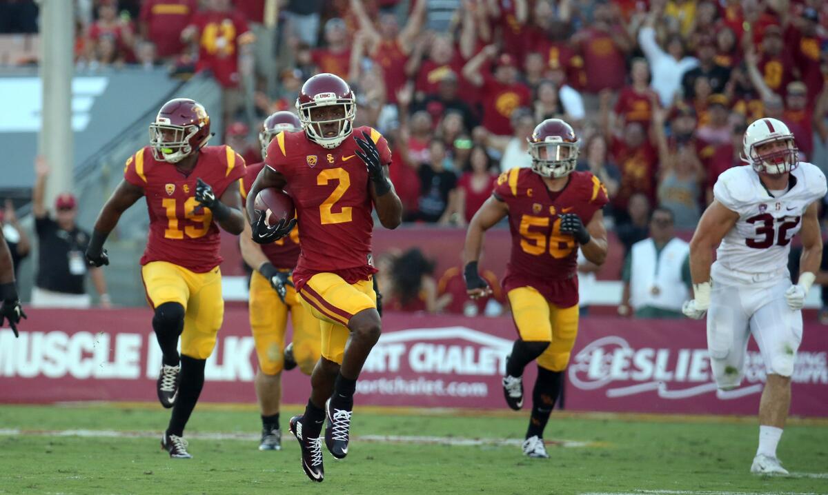 USC cornerback Adoree' Jackson breaks free for an apparent touchdown on a kick return against Stanford, but it was nullified by a penalty.