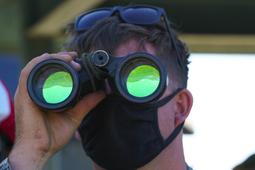 Sgt. Ryan Dills serves as the master gunner as he calls up targets for the Amphibious Combat Vehicle
