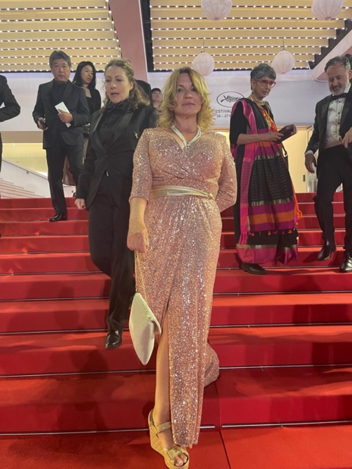La Jolla resident Nellee Holmes (center) attends the Cannes Film Festival.