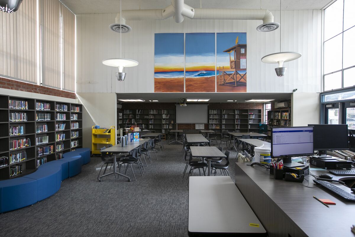 A mural of a lifeguard tower, painted by Jennifer Bloomfield, is in the library at Ensign Intermediate School.
