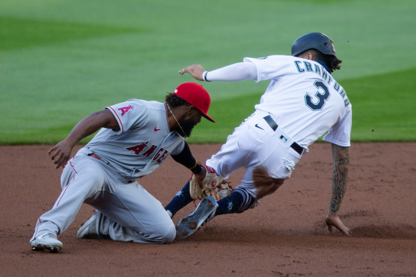 SEATTLE, WA - AUGUST 05: Luis Rengifo #4 of the Los Angeles Angels can't get the tag on J.P. Crawford.