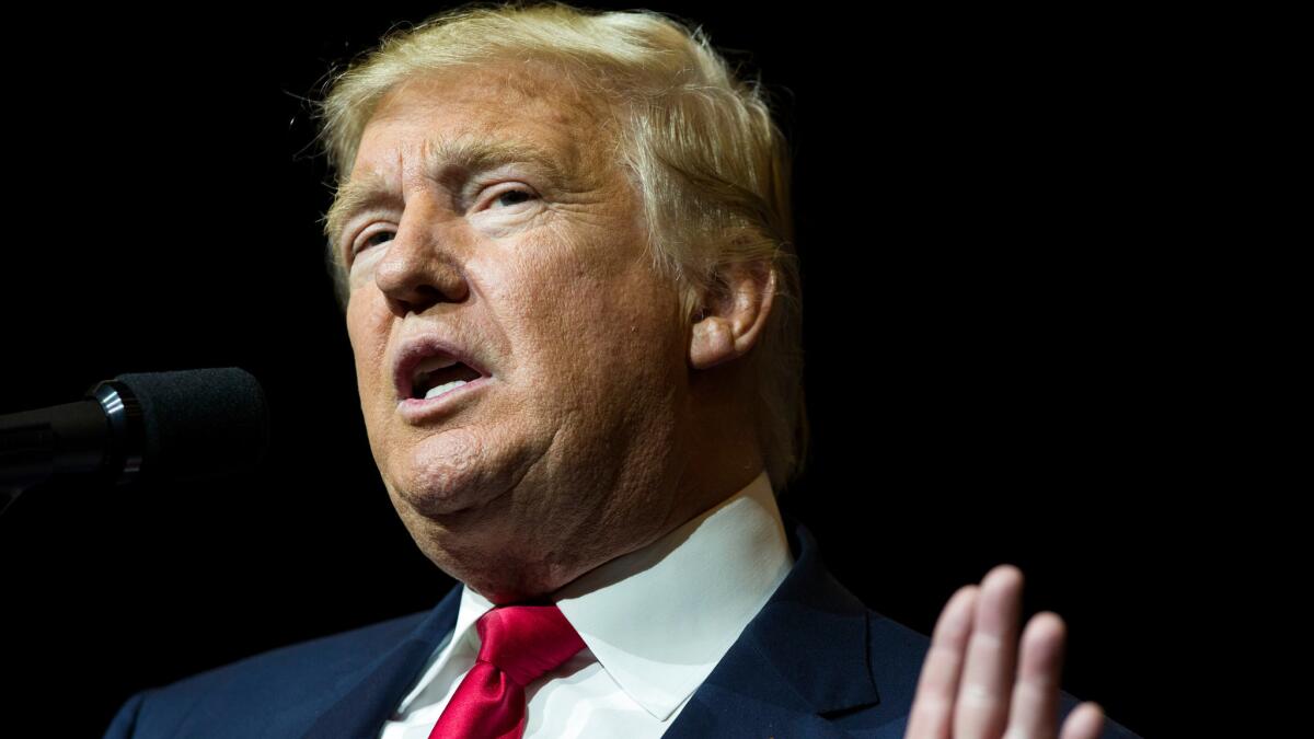 Republican presidential candidate Donald Trump speaks during a campaign rally at the South Florida Fairgrounds and Convention Center in West Palm Beach, Fla., on Thursday.