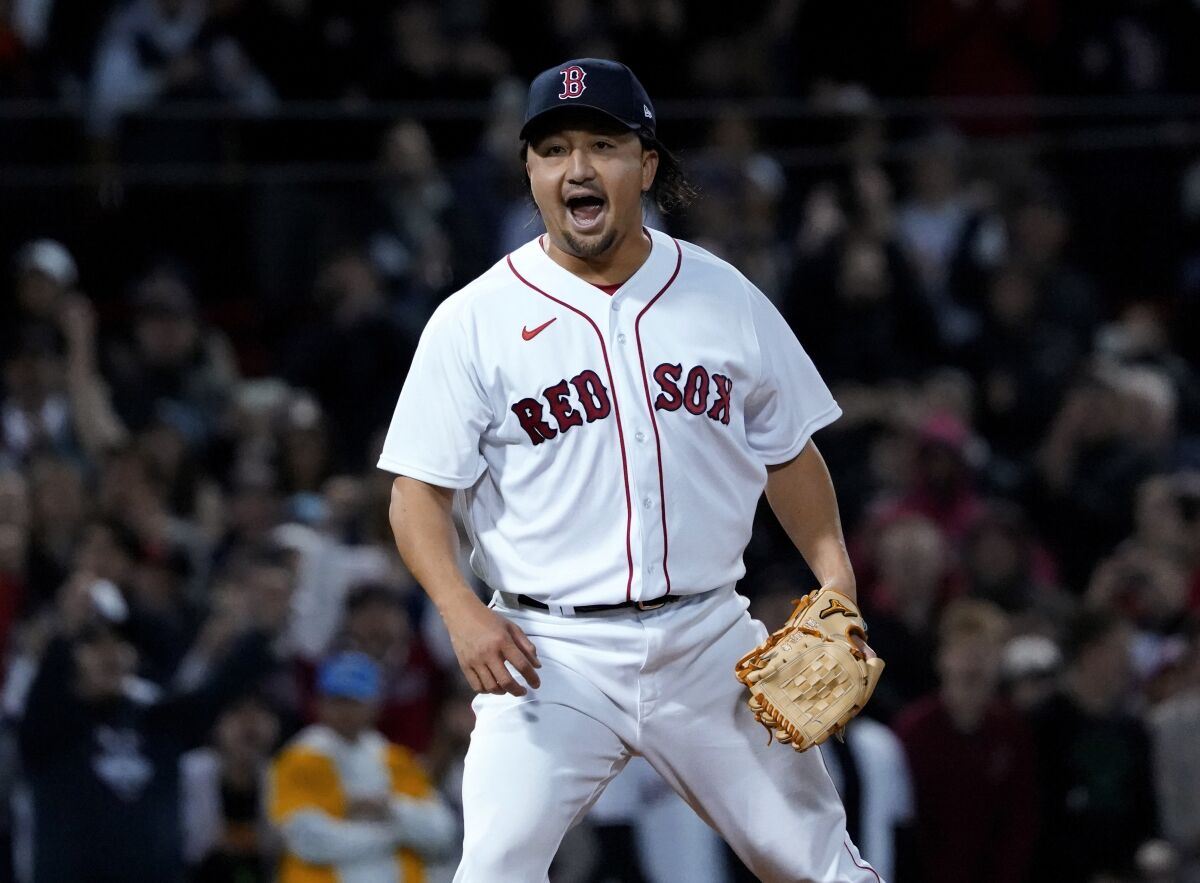 Boston Red Sox pitcher Hirokazu Sawamura reacts after striking out Los Angeles Angels' Shohei Ohtani to end the baseball game at Fenway Park, Tuesday, May 3, 2022, in Boston. (AP Photo/Mary Schwalm)