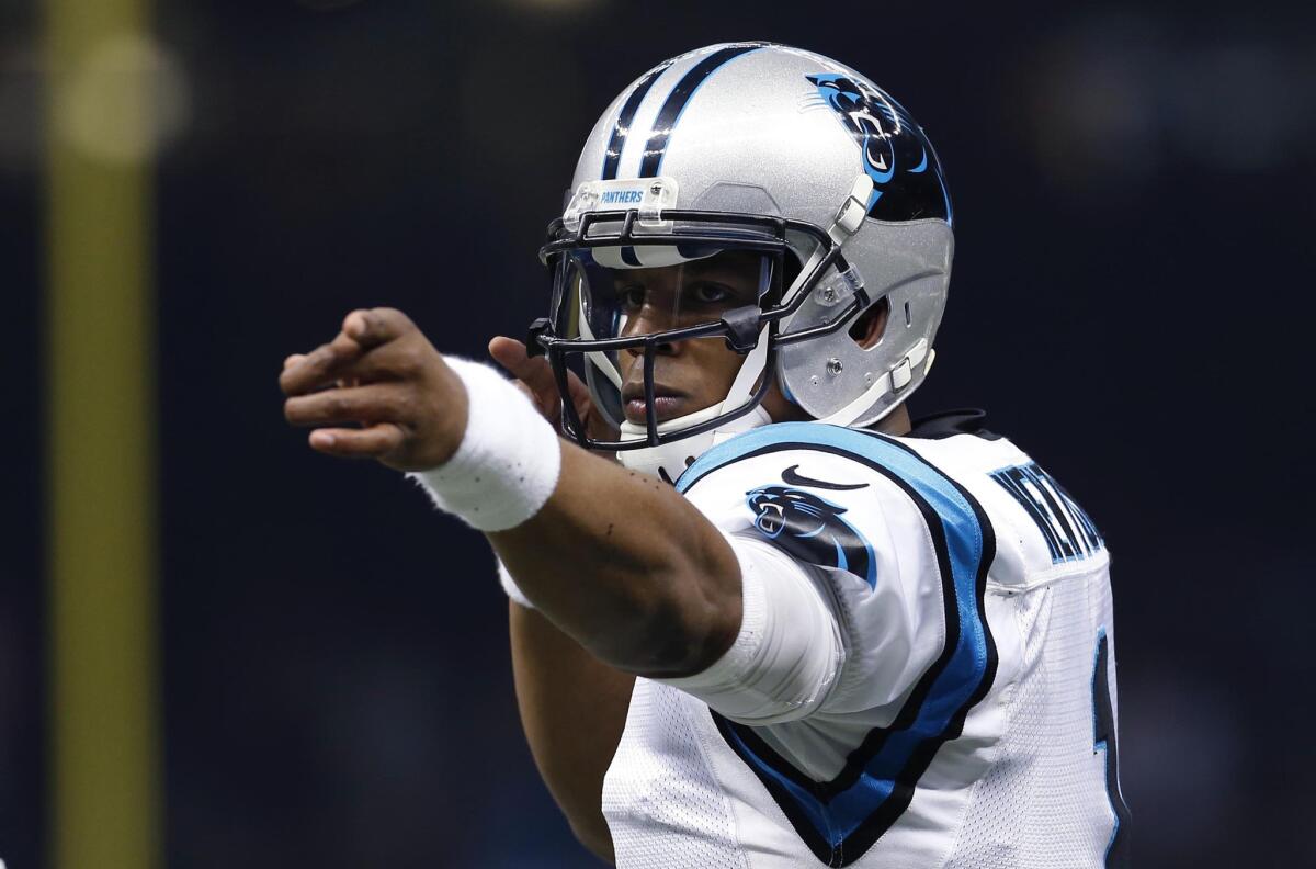 Panthers quarterback Cam Newton (1) reacts after a big play in the first half against the Saints.