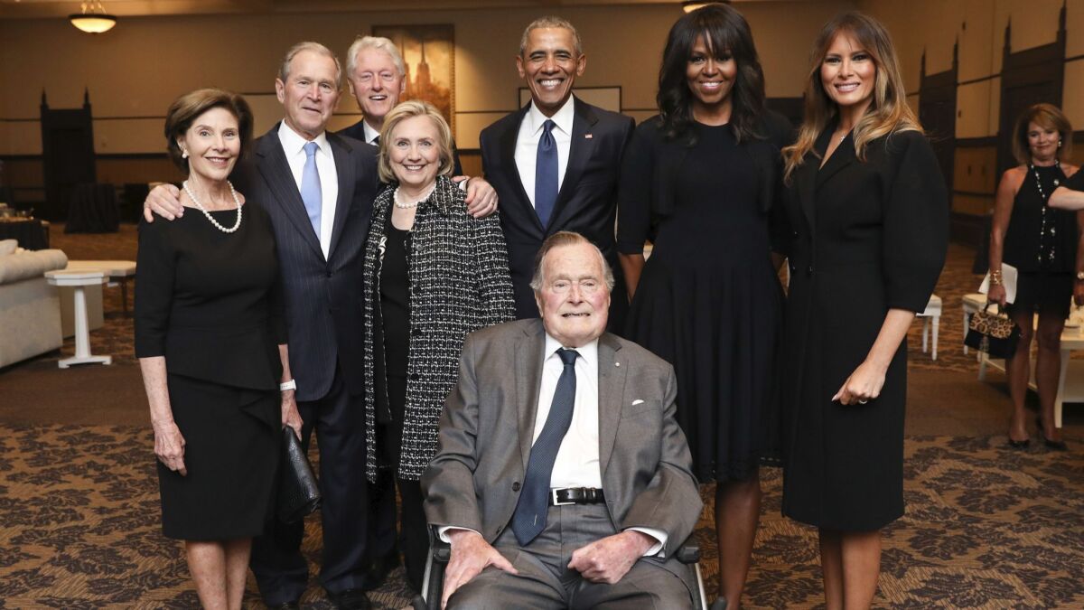 At Barbara Bush's funeral: Laura Bush, left, George W. Bush, Bill Clinton, Hillary Clinton, George H.W. Bush, Barack Obama, Michelle Obama and Melania Trump.
