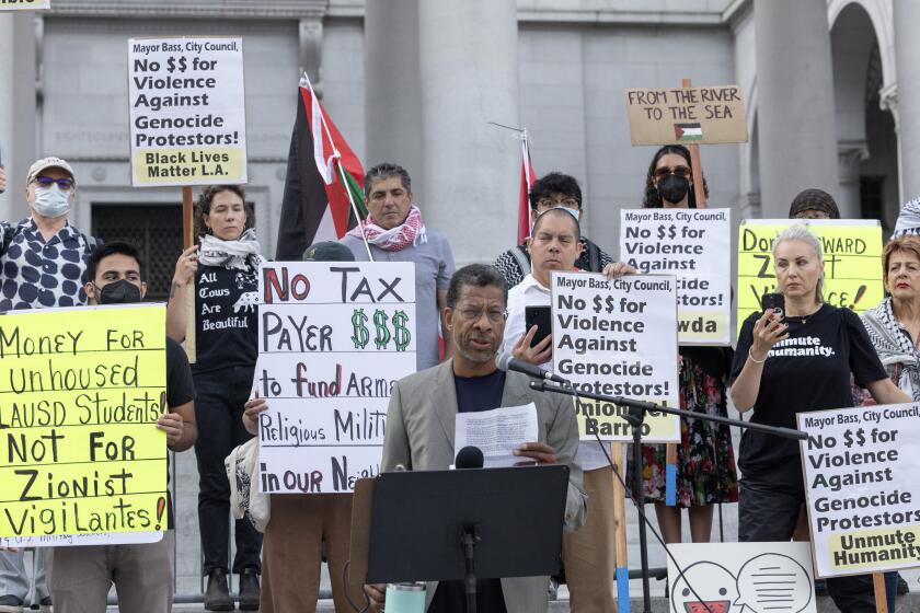 LOS ANGELES, CA - JULY 02: John Parker of the Harriet Tubman Center for Social Justice, was among a group of speakers at City Hall in Los Angeles, CA on Tuesday, July 2, 2024, opposing a proposed City Council resolution that would provide upwards of $1 million to Pro-Israel vigilante/security companies for Zionist Defense training. (Myung J. Chun / Los Angeles Times)